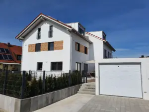 Neubau München – modernes Doppelhaus mit Garage